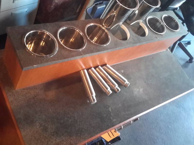 lot 11 image: Condiment Center w Chrome inserts.. Wood veneer and Laminate top.. 43in x 20 in x 37 in plus 7 12 tall top unit.