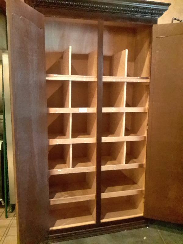 lot 49 image: Nice solid wood Armoire.. 48 in w x 19 in d x 96in h.. Crown molding that matches lot 20A