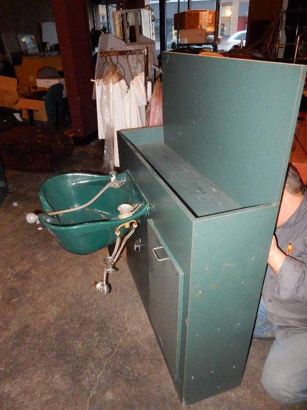 lot 165 image: Shampoo bowls with Plumbing Cabinet.. Shampoo Bowls come with back flow preventer.. Overall dimensions of all.. 42 in x 12 in x 40 in with 16 in Backsplash.