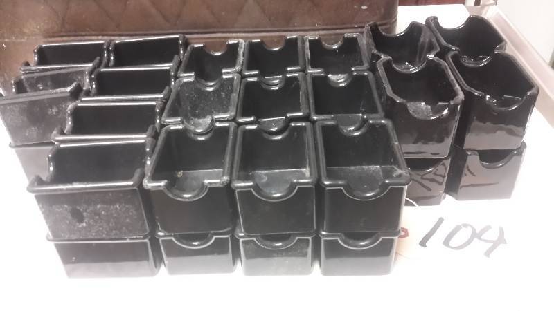 lot 104 image: 34, Black Plastic Condiment holders