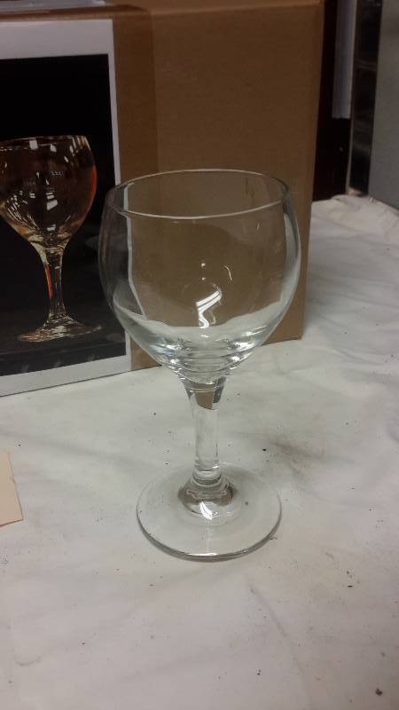 lot 114 image: 24 plain wine glasses..new in case..