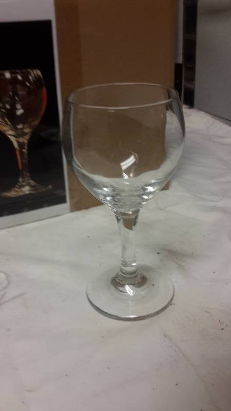 lot 116 image: 24 plain wine glasses..new in case..