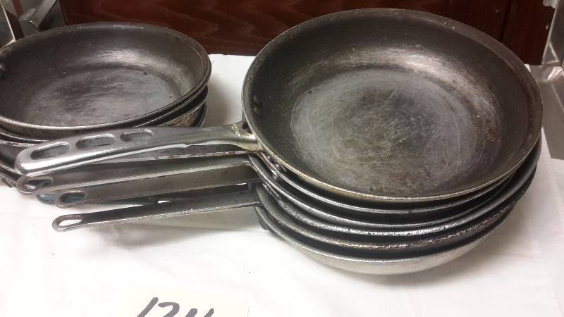 lot 124 image: 11, 10 in frying pans