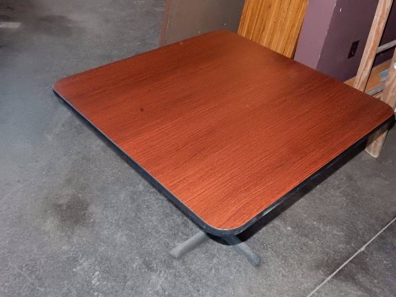 lot 182 image: Cherry Wood Venere  and black edge Table with one pedestal.  24in x 24in x 29 in  tall.   Has some scratches but none real bad.
