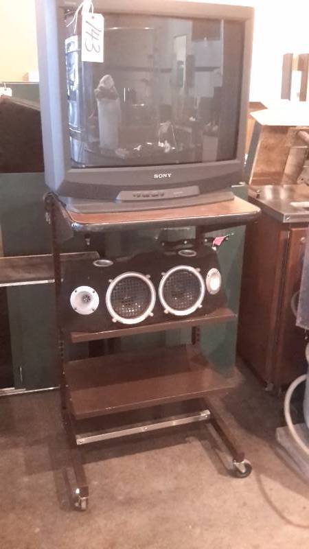 lot 143 image: SONY Trinitron TV on Cart.. Has RAMPAGE speaker system Included