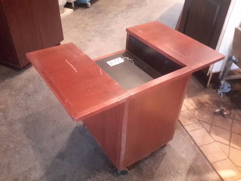 lot 224 image: AV Stand with fold down side shelves.. Simulated wood finish.