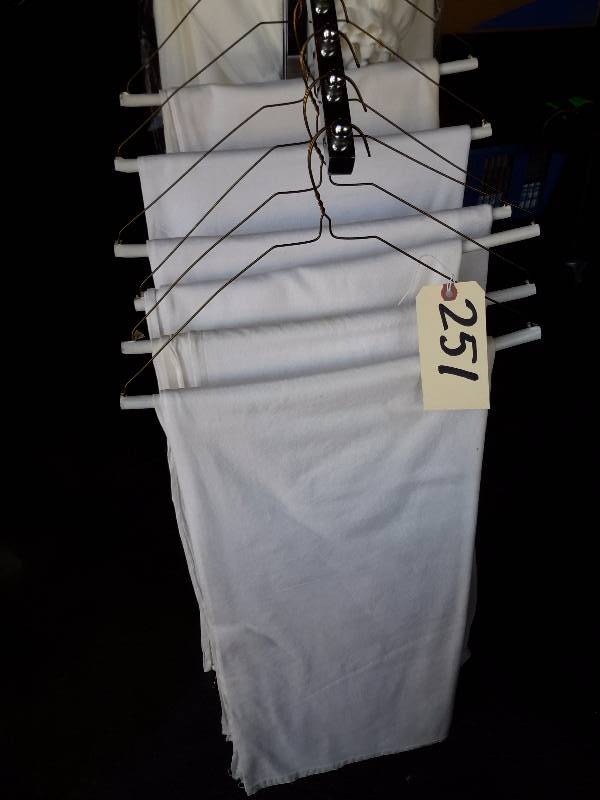 lot 251 image: 11, White Cotton Table cloths.. A few stains similar to what is shown, but please inspect if that is important to you.  54 in x 120 in