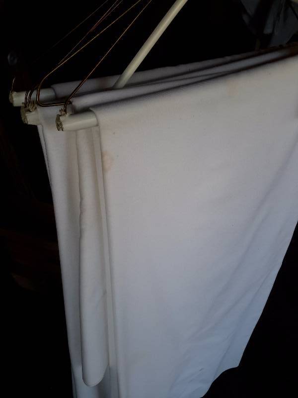 lot 252 image: 6, White Polyester Table Cloths with some stains.. 54in x 120 in