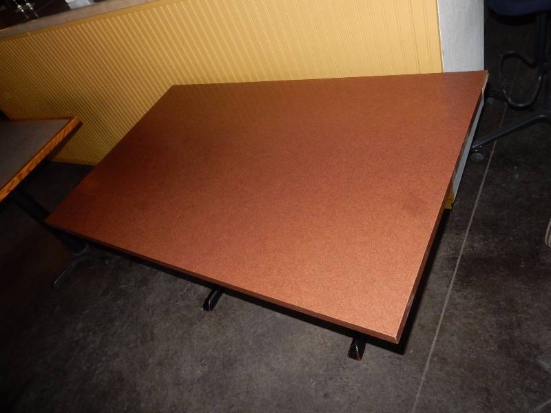 lot 186 image: Brown laminate Veneer, 48in x 30 in x 29 in.. 2 pedestals. This is an example.. All have some scratches but not bad.Please inspect.