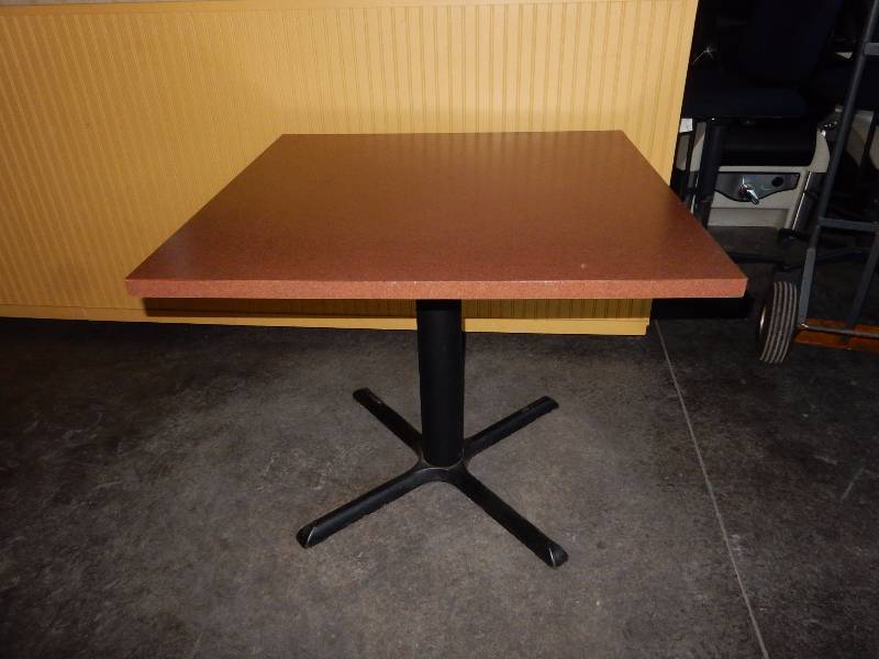 lot 177 image: Brown laminate Veneer, 36in x 36in x 29 in.. Single pedestal.. This is an example.. All have some scratches but not bad. Please inspect.