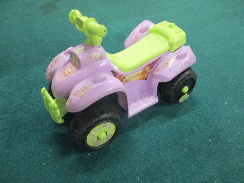 Purple and Green 4 Wheel Bike...