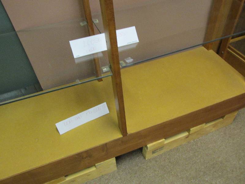 Glass display case, 51 wide, 15 deep.  This will add value and interest to your collection or inventory