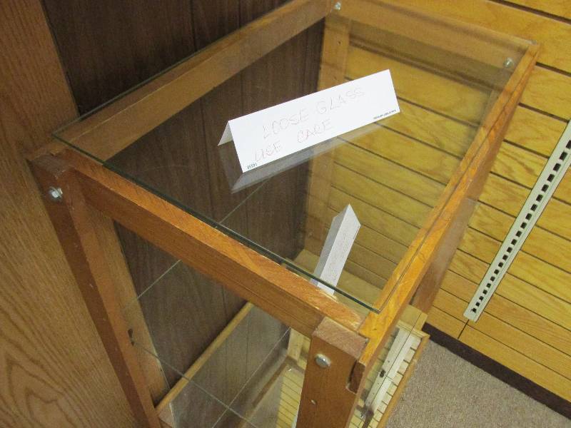 Glass retail or collector display shelf.  Nice look adds intrigue and interest to your inventory  34 tall, 26 wide.