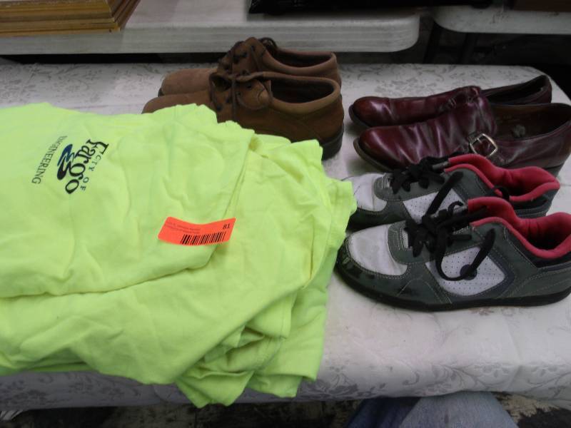 suit cases, shoes and tee shirts