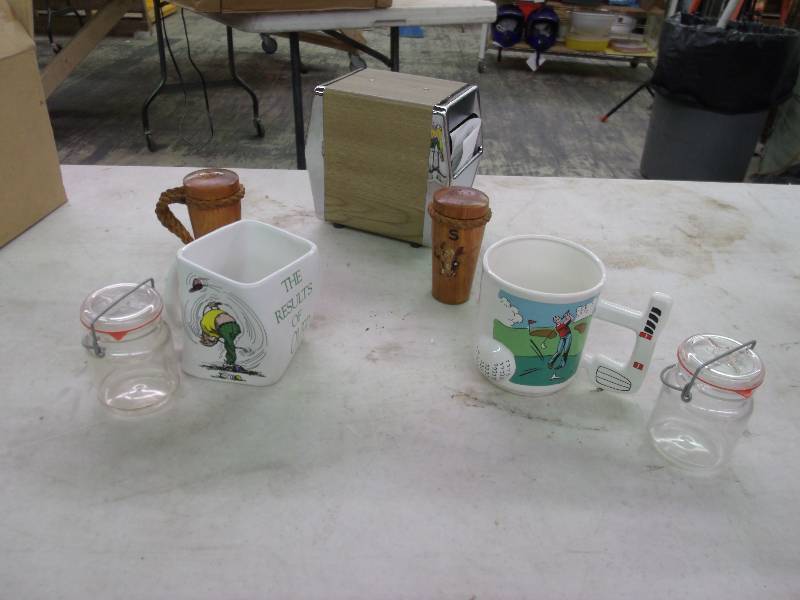 plastic jars, napkin holder and golf themed cups
