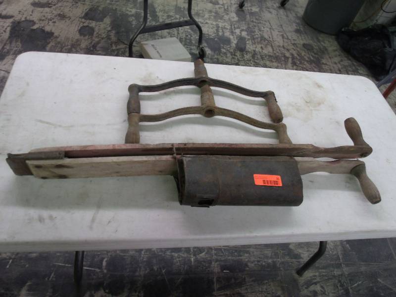 Antique corn planter and old handles