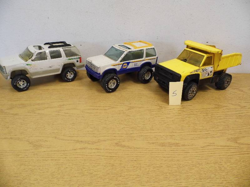 3 Trucks - One is Tonka
