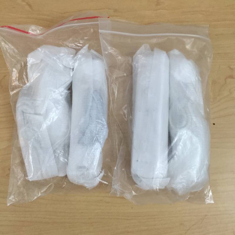 lot 46 image: 2 New Nintendo Wii Remote and Nunchuck Controller Combo White by Gator Crunch