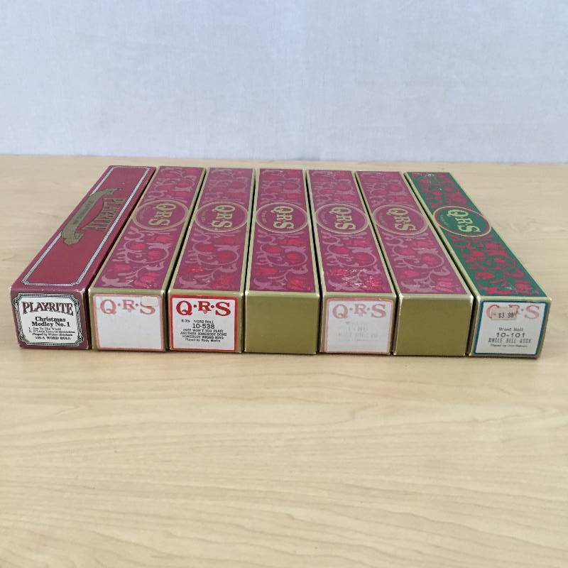lot 73 image: WOW VINTAGE Boxed Lot of 7 PLAYER PIANO HOLIDAY CHRISTMAS MUSIC ROLL PLAYRITE PLUS QSR Ragtime Country & More  Excellent