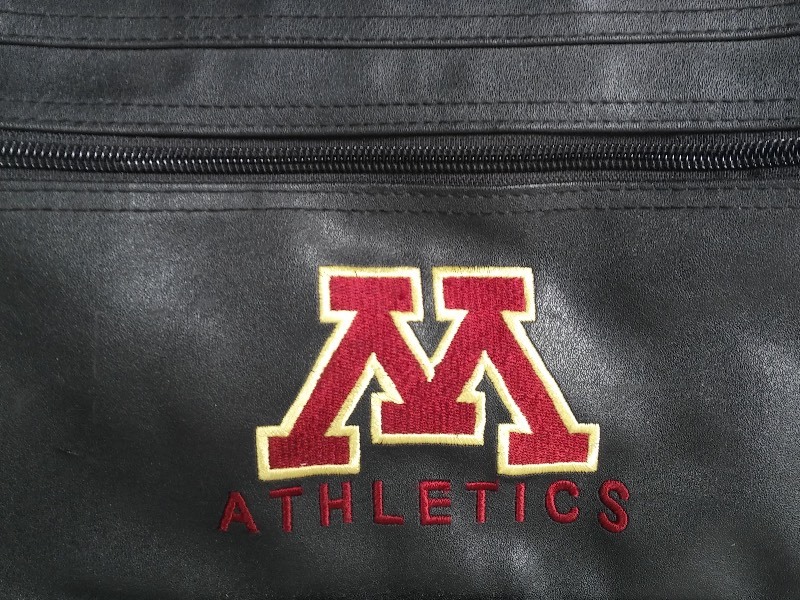 Mid-Size U of M Black Leather Duffle Bag (never used)