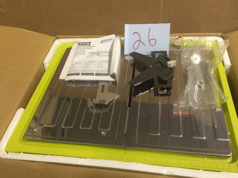 lot 26 image: Ryobi 7 in Tile Saw