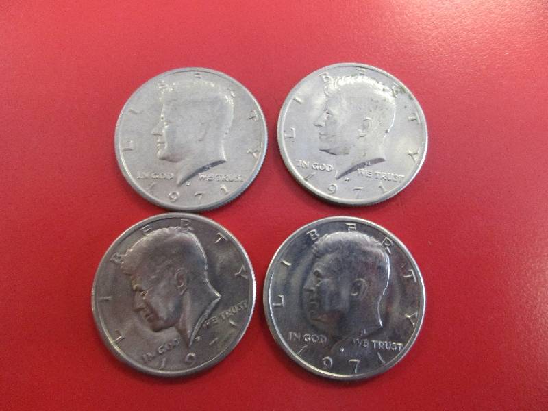 lot 31 image: Lot of (4) Kennedy Half Dollars