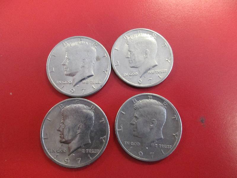 lot 32 image: Lot of (4) Kennedy Half Dollars