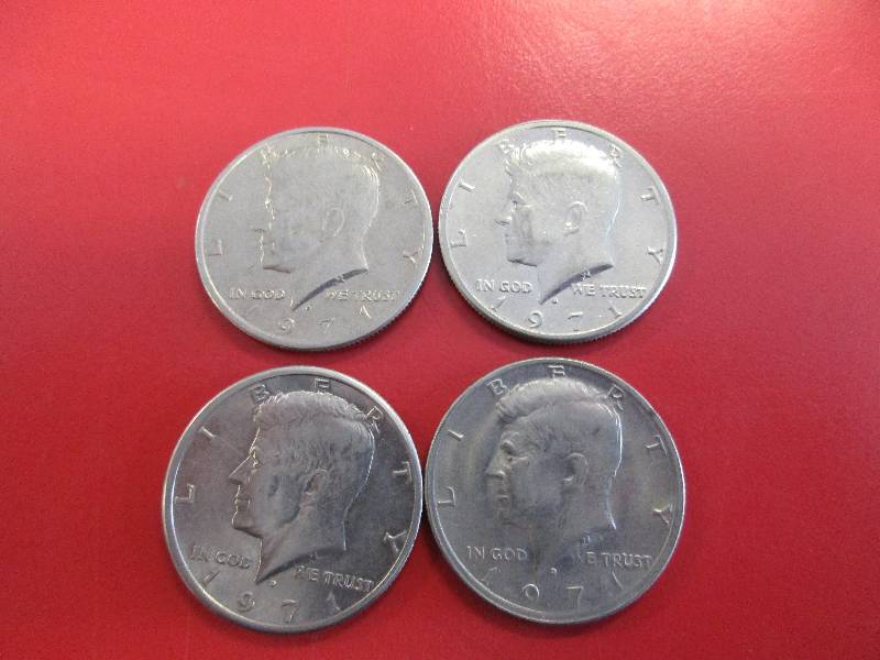 lot 33 image: Lot of (4) Kennedy Half Dollars