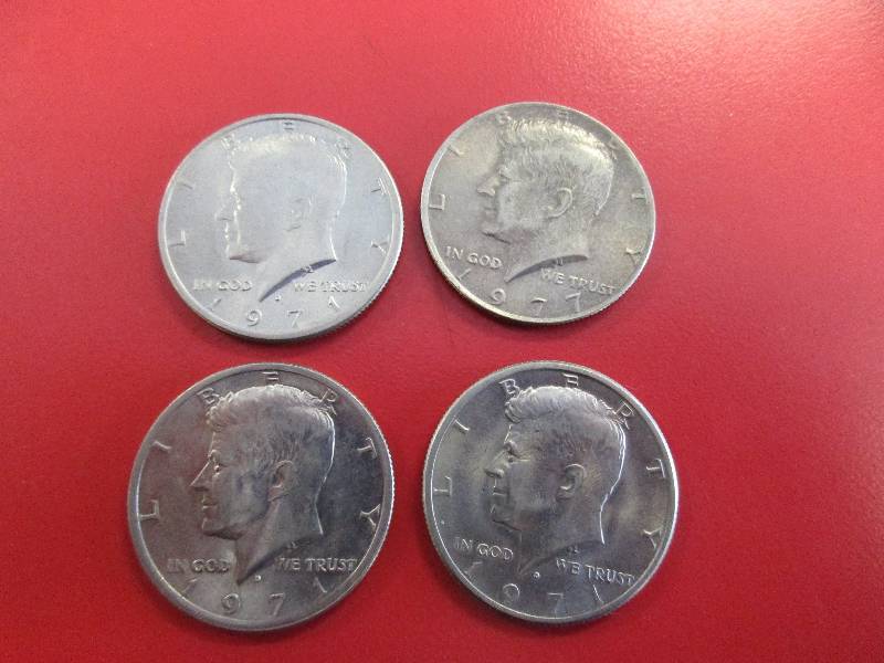 lot 34 image: Lot of (4) Kennedy Half Dollars