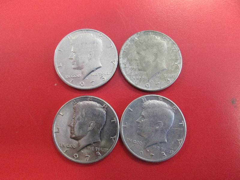 lot 35 image: Lot of (4) Kennedy Half Dollars