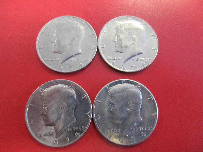 lot 39 image: Lot of (4) Kennedy Half Dollars