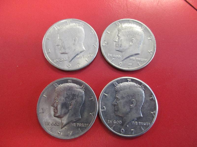 lot 42 image: Lot of (4) Kennedy Half Dollars