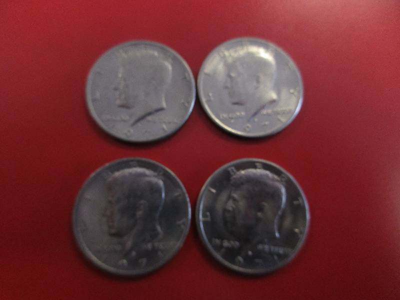 lot 43 image: Lot of (4) Kennedy Half Dollars