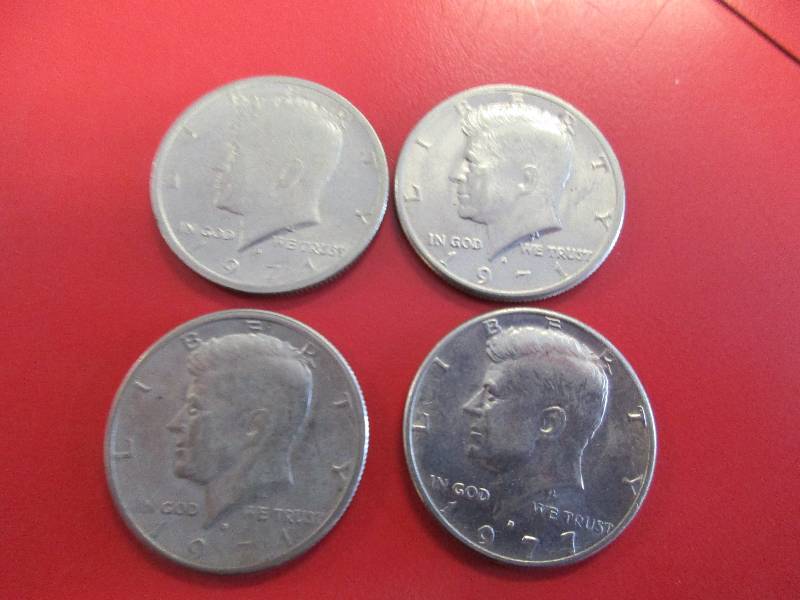 lot 45 image: Lot of (4) Kennedy Half Dollars