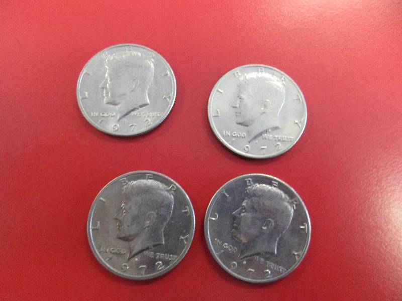 lot 46 image: Lot of (4) Kennedy Half Dollars
