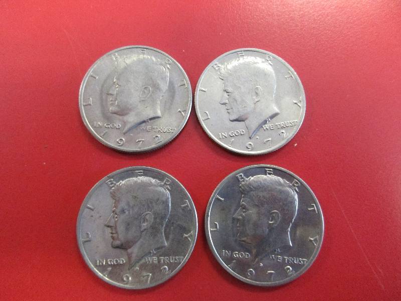 lot 47 image: Lot of (4) Kennedy Half Dollars