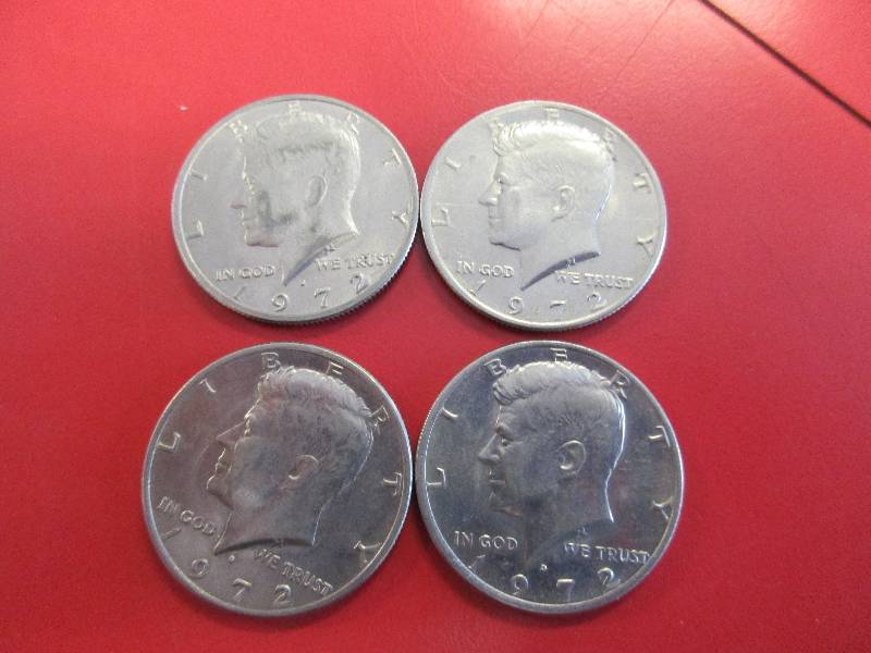 lot 48 image: Lot of (4) Kennedy Half Dollars