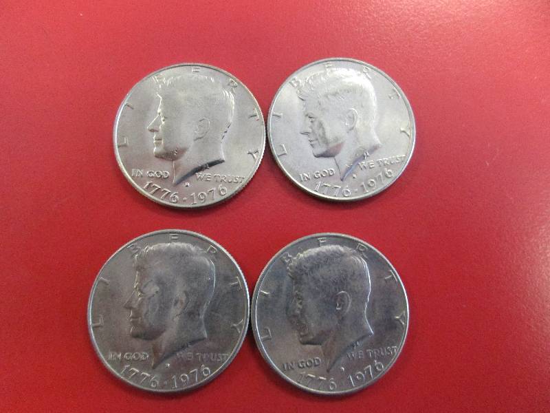 lot 52 image: Lot of (4) Kennedy Half Dollars