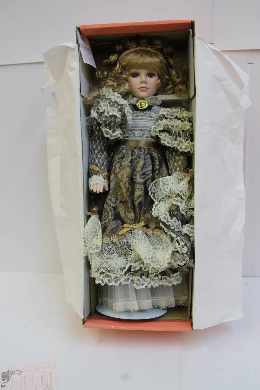lot 9 image: Bradleys Collectible Doll Claudia