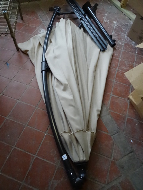 lot 61 image: Brand New Crank Out Patio Umbrella