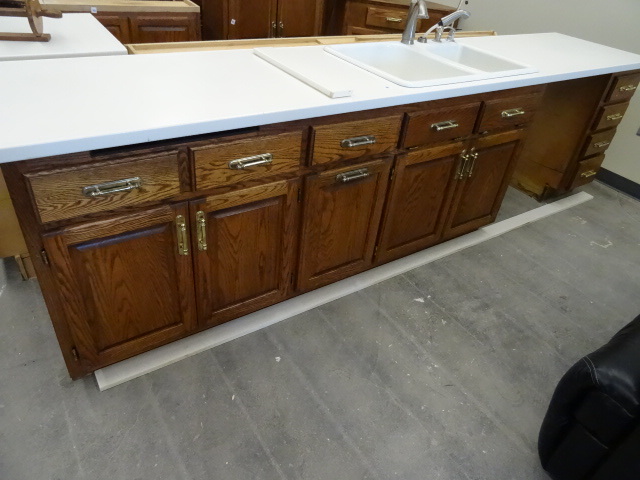 Kitchen Counter with Sink and Faucet.