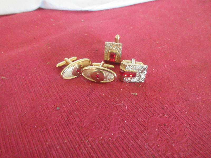 lot 95 image: RUBY CUFFLINKS