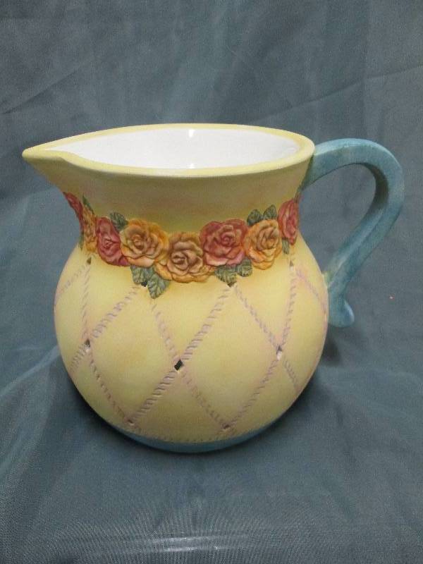 Ceramic Oil or Wax Burner uses teal...