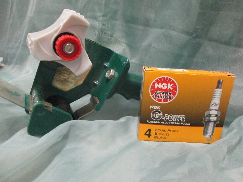 Packing Tape gun and spark plugs...