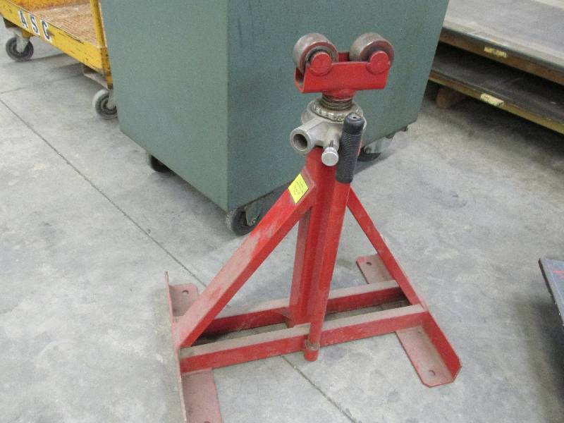 Equipment lift with rollers on top,...