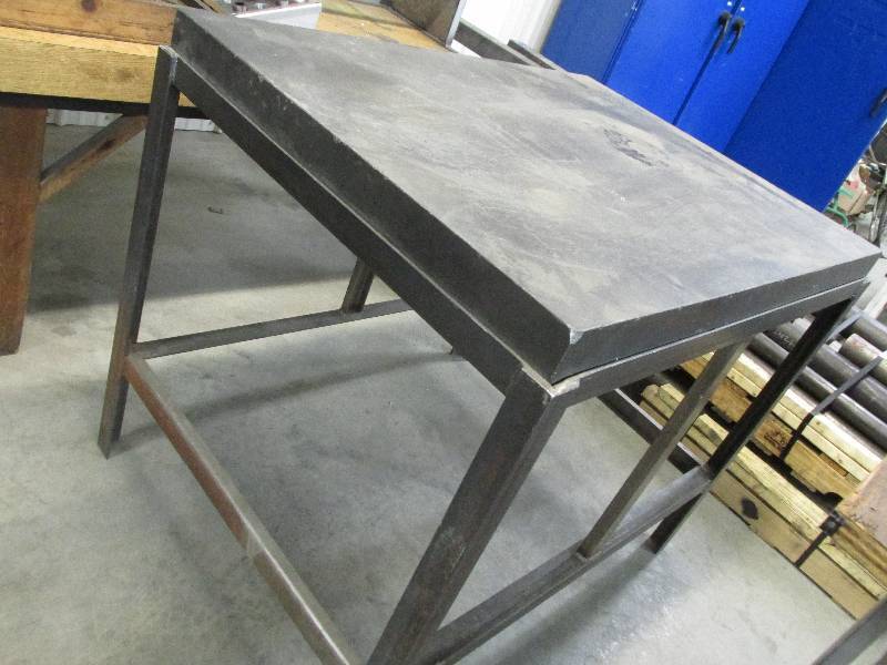 Granite top work table, top slab is...