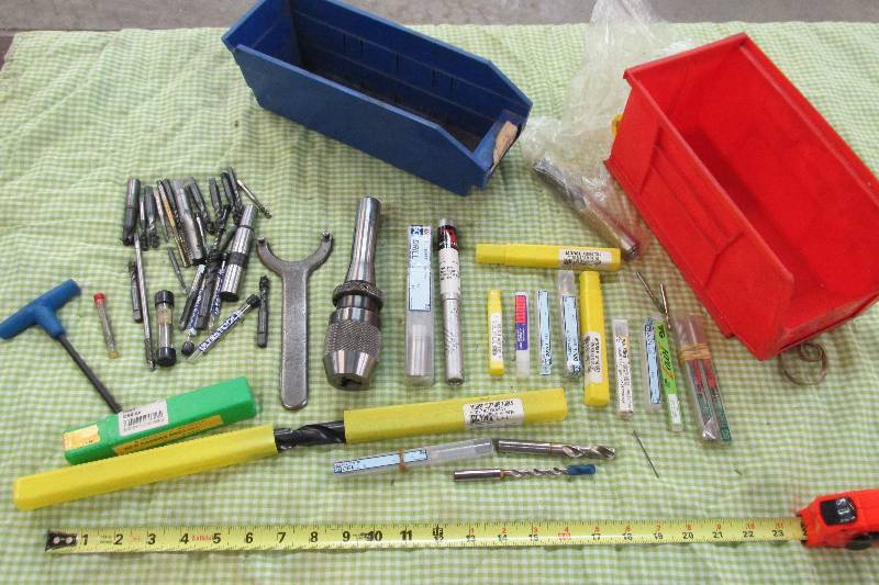 2 plastic bins of drill bits and su...
