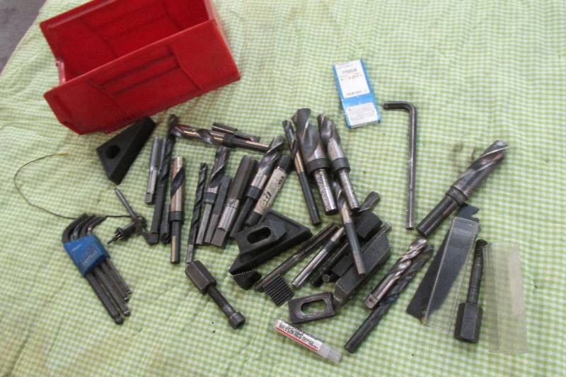 Bin of wernches, bits, clamp and mo...