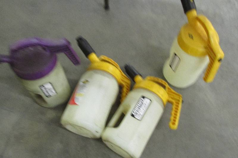 Lot of Trico containers...