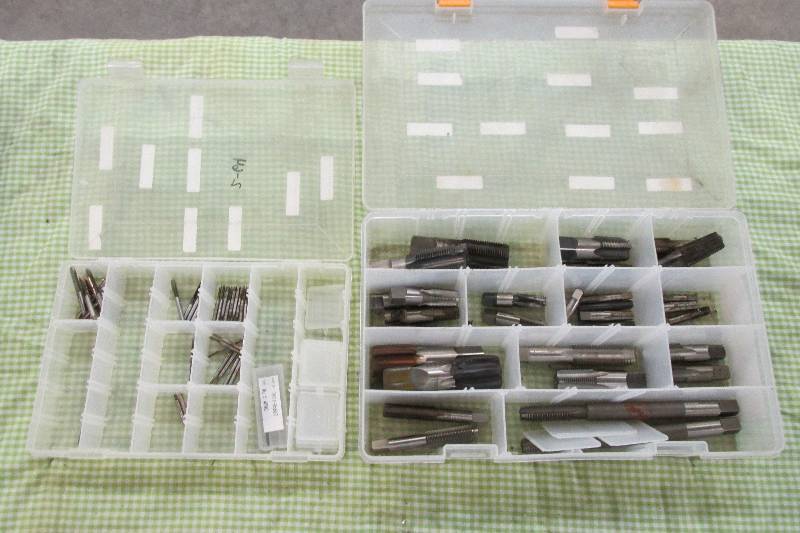 2 plastic organizers of taps...